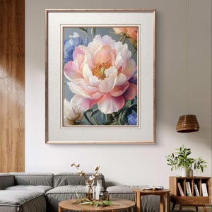 May include: A framed painting of a large, pink peony flower with a white center. The flower is surrounded by green leaves and other smaller flowers.