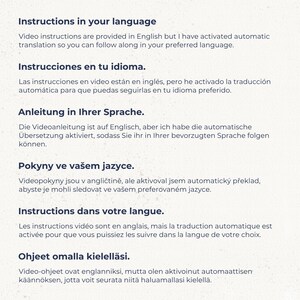May include: A white informational document featuring text in multiple languages, including English, Spanish, German, Czech, French, and Finnish, explaining that video instructions are in English with automatic translation enabled for user convenience.