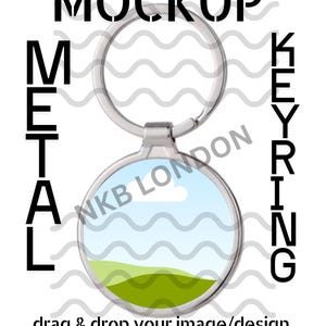 May include: A silver metal keyring with a circular design area. The design area features a landscape with a blue sky, white cloud, and green grass. The text "MOCKUP METAL KEYRING" and "drag & drop your image/design" are displayed.