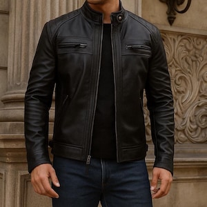 front view of model wearing a black color leather jacket with 2 pockets on chest and 2 pockets on below