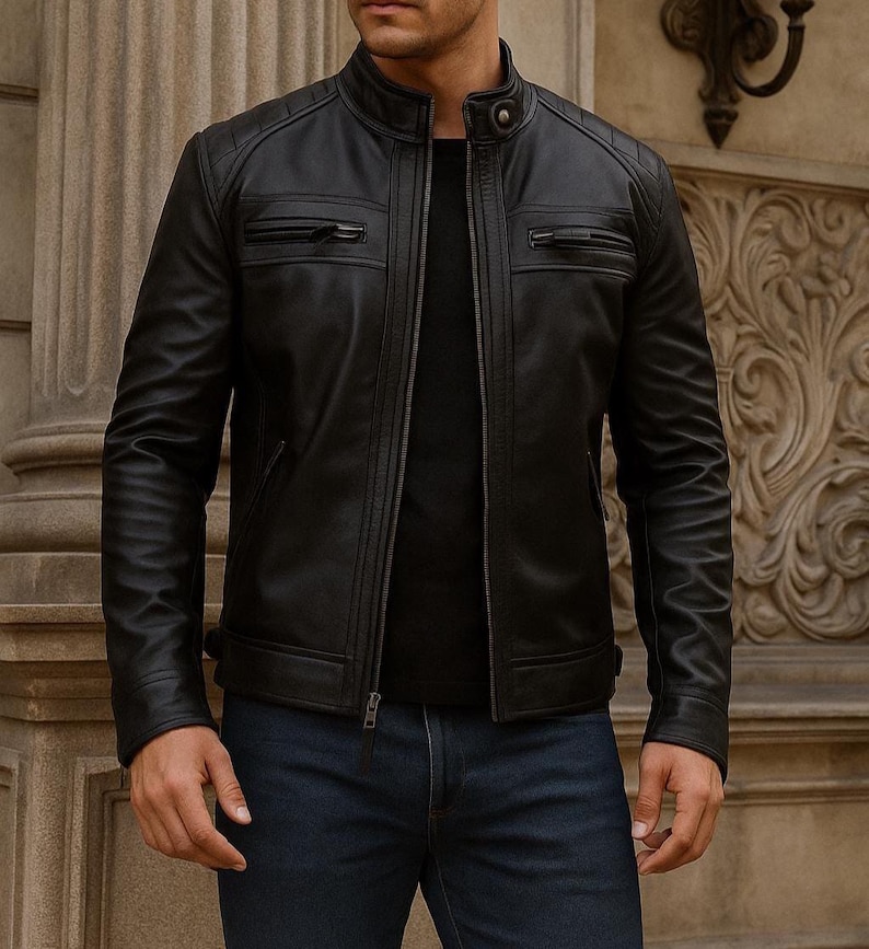 front view of model wearing a black color leather jacket with 2 pockets on chest and 2 pockets on below