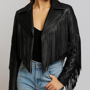 Women’s black sheepskin leather fringe jacket with Western rodeo design and zip closure