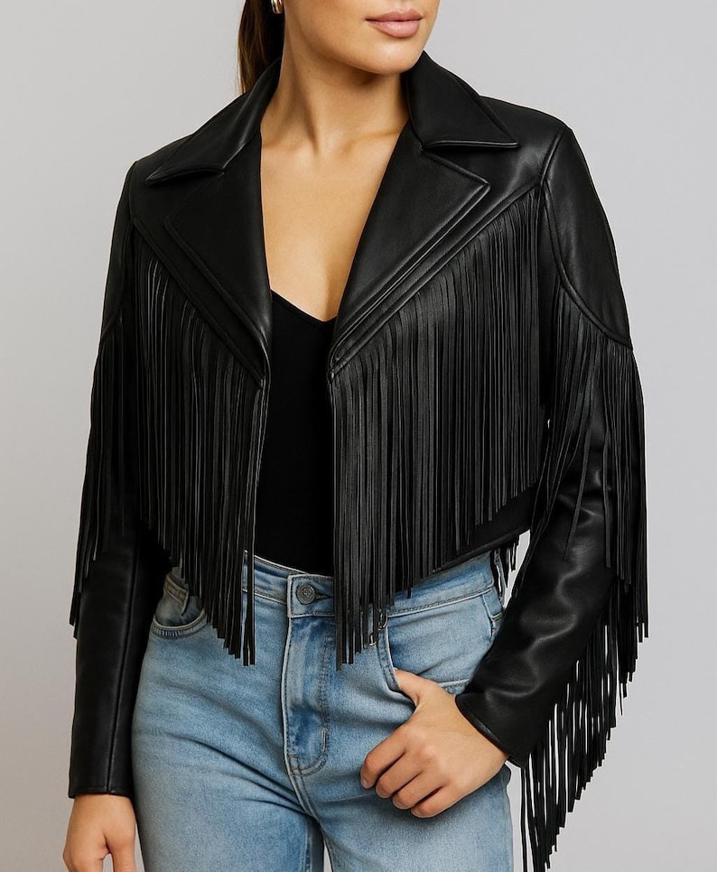 Women’s black sheepskin leather fringe jacket with Western rodeo design and zip closure