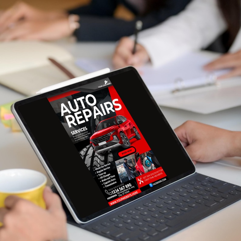 May include: A tablet displaying a red and black advertisement for auto repairs. The ad features a red car, a list of services, a phone number, and the website address "www.yourwebsitehere.com".
