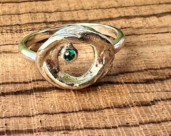 Sterling silver handmade organic form ring with emerald green cubic zirconia, hallmarked in Edinburgh