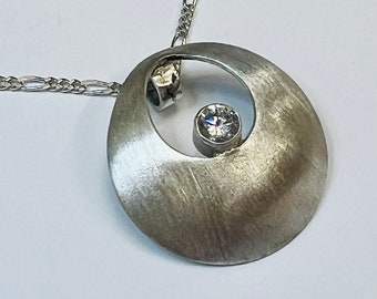 sterling silver handmade domed pendant with 4mm cubic zircon, Hallmarked in Edinburgh