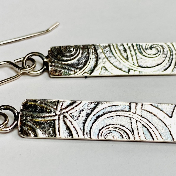 Sterling silver handmade embossed print earrings. Hallmarked in Edinburgh