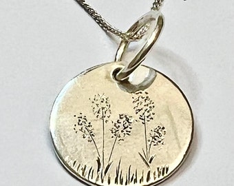 Sterling silver hand engraved disc pendant