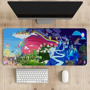 May include: A colourful cartoon-style desk mat featuring characters from the animated series Adventure Time. The mat depicts a landscape with mountains, trees, and a rainbow.