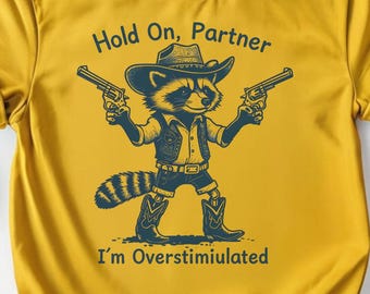 Cowboy Raccoon Graphic T-Shirt: Funny Animal Lover Tee, Western Theme Tee, Animal Lover Shirt, Cool Raccoon Design, Unisex Graphic Shirt