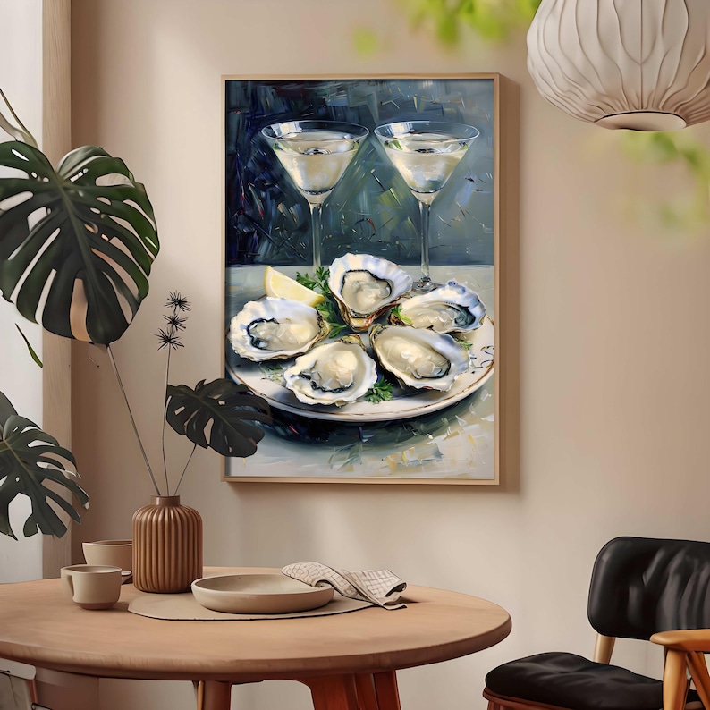 May include: A framed painting depicts a still life of oysters on a plate with two martini glasses. The oysters are arranged on a decorative plate with a lemon wedge and greenery. The martinis are in tall, stemmed glasses.