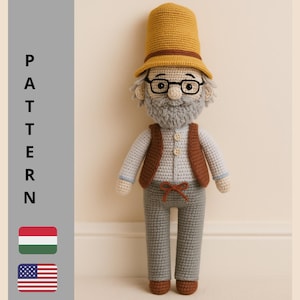 Op de afbeelding: Gehaakte pop van een oudere man met een gele hoed, bril en bruin vest. De pop heeft een grijze baard en draagt een lichtblauw overhemd en een grijze broek. Het woord "PATTERN" staat verticaal aan de linkerkant.