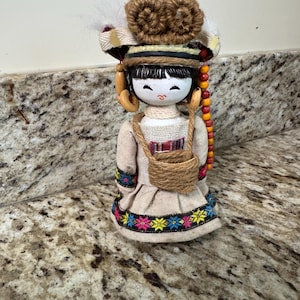 vintage wooden doll. Asian, maybe Tibetan.