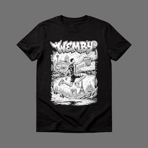 May include: Black t-shirt featuring a black and white graphic of a basketball player dunking. The graphic includes the word "WEMBY" and the Eiffel Tower. The player is wearing a jersey with the number 1.