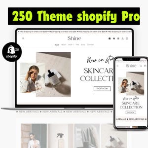 May include: A laptop computer displaying a website for a skincare company called "Shine". The website features a product image of a bottle of skincare product and the text "New in store Skincare Collection Shop Now". The laptop is on a white surface with a smartphone displaying the same website.