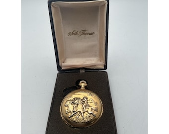 Reloj de bolsillo vintage Seth Thomas con relieve de vaquero del oeste