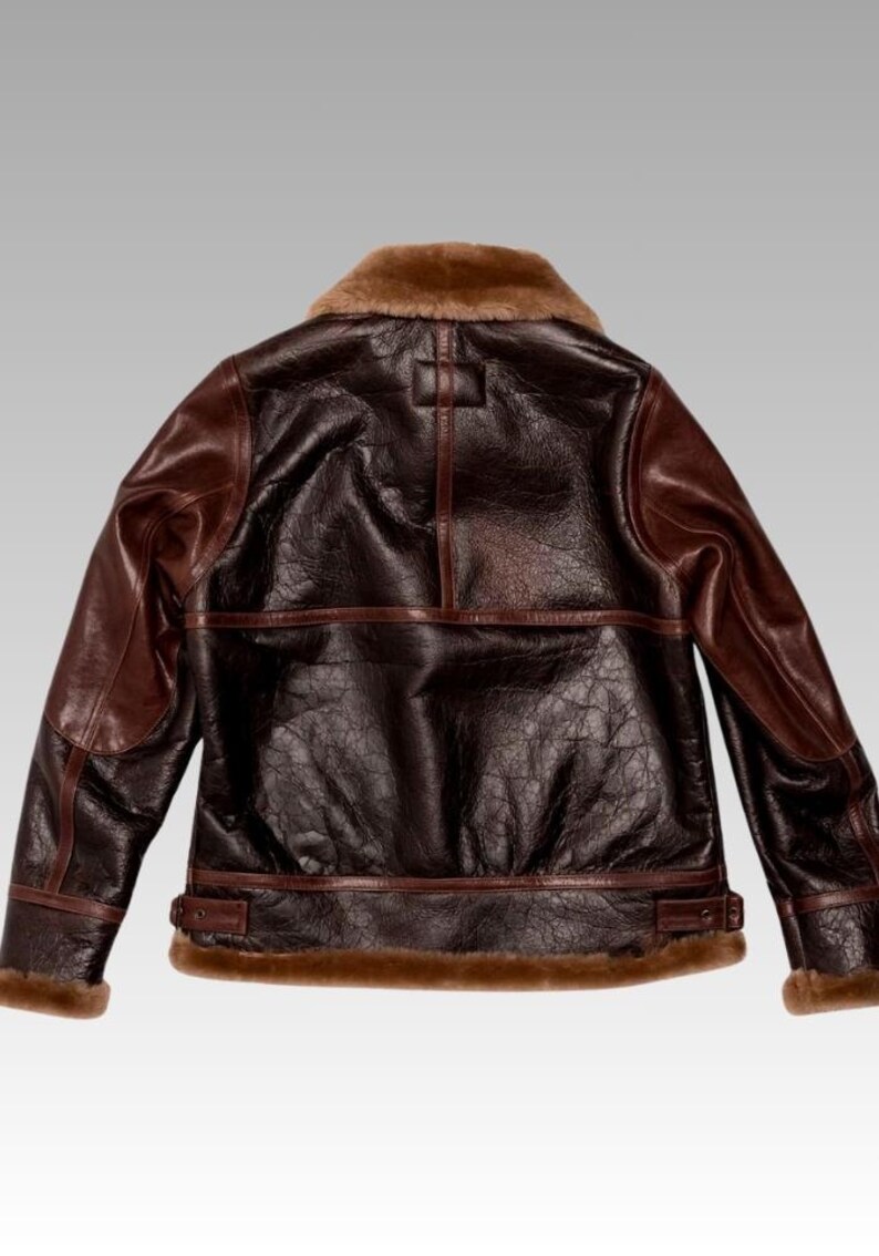 Front view of sheepskin leather jacket with soft faux shearling lining, zip closure, and timeless winter fashion design.
