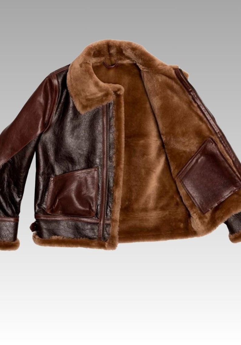 Front view of sheepskin leather jacket with soft faux shearling lining, zip closure, and timeless winter fashion design.