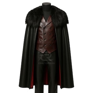 May include: A black cape with a faux fur collar, paired with a burgundy vest and black pants. The vest has a double-breasted design. The lining of the cape is red. The logo "CRAFTORIAAN" is visible.