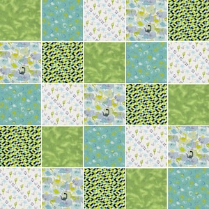 May include: A patchwork design featuring a variety of fabric squares. The squares display patterns of dinosaurs, cacti, and geometric shapes in shades of green, blue, and white. The overall design is a grid of 5x5 squares.