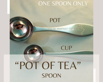 May include: Two stainless steel tea spoons, one larger for a pot of tea and a smaller one for a cup. The spoons have a reflective surface and are labeled "POT" and "CUP". The text "ONE SPOON ONLY" and "POT OF TEA SPOON" are also visible.