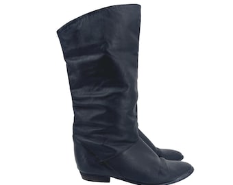 Botas vintage de los 80 de cuero negro, estilo holgado, con punta puntiaguda, hasta la pantorrilla, talla 8.5 M. ¡Excelentes críticas!