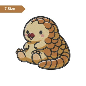 May include: An embroidered pangolin design in shades of tan and brown, with a light beige face and a red nose. The pangolin is sitting with its paws forward. The text "7 Size" is in a brown banner.