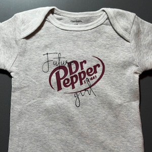 Future Dr Pepper baby girl onesie