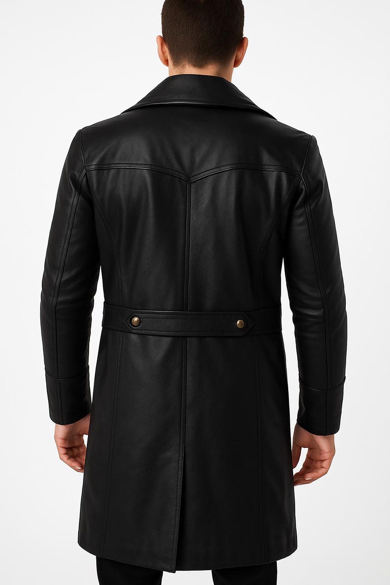 May include: A black leather coat with a double-breasted closure and a belt in the back.