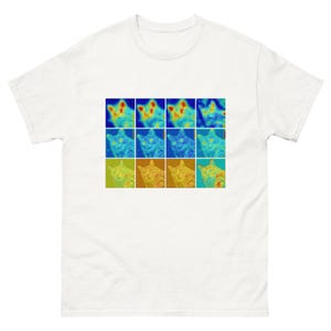 May include: A white t-shirt with a colorful image of a cat's face repeated in a grid pattern.