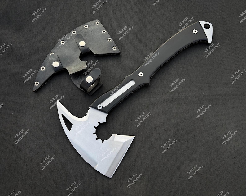 RE9 inspired full tang steel hatchet collectible displayed on wooden stand with detailed handcrafted finish.