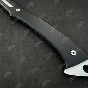 Full tang RE9 inspired hatchet replica with modern tactical design and high quality micarta handle finish.