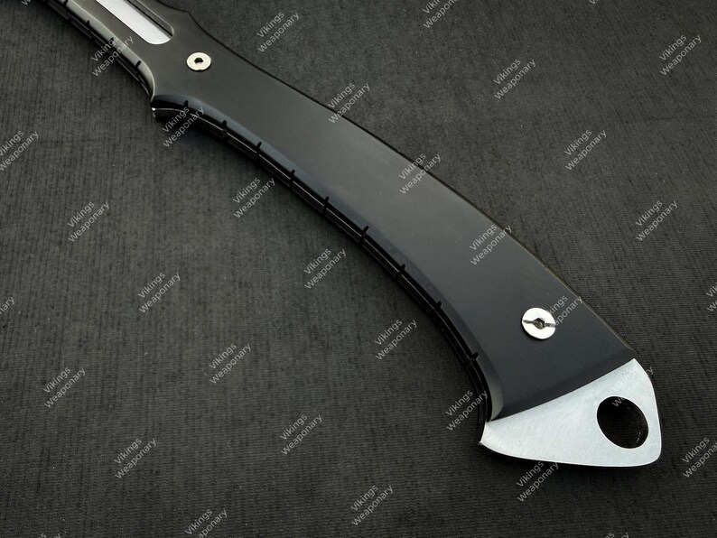 Full tang RE9 inspired hatchet replica with modern tactical design and high quality micarta handle finish.