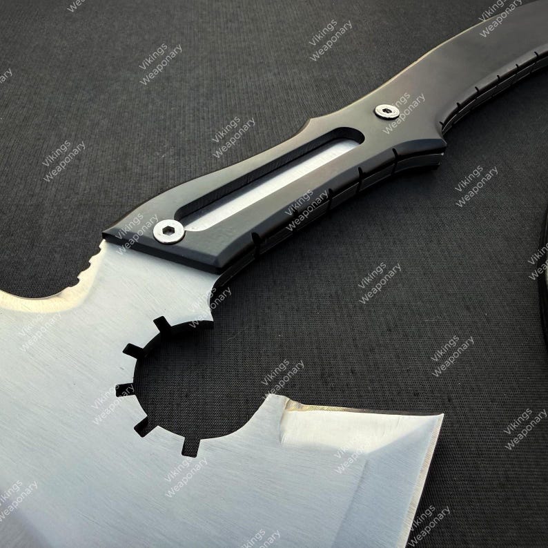 Leon Kennedy inspired collectible axe featuring durable black coated steel and detailed replica craftsmanship.