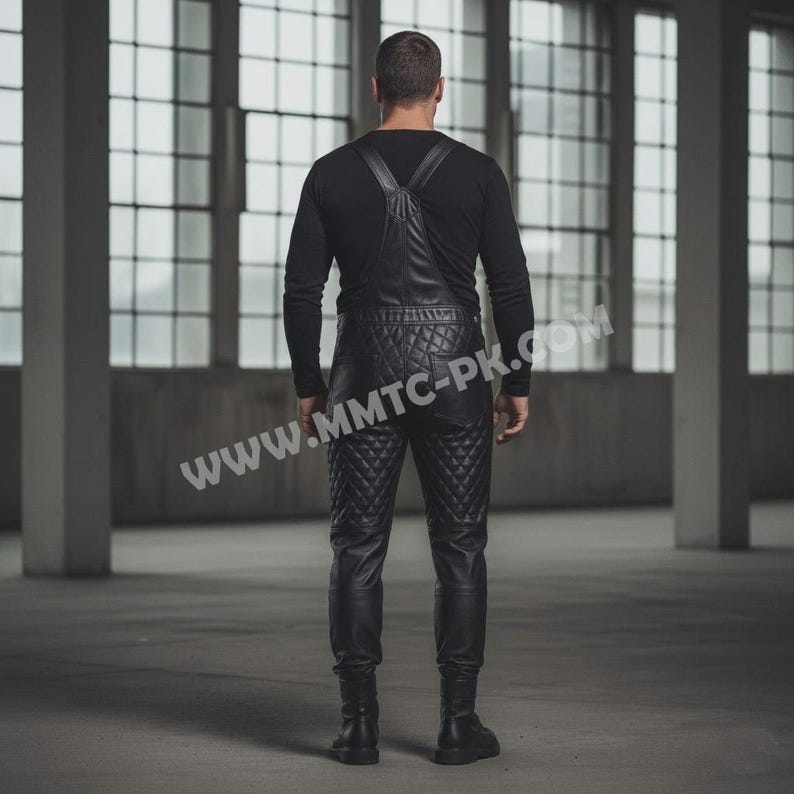 May include: Black leather overalls with a quilted diamond pattern on the legs. The overalls have suspender straps and are paired with a long-sleeved black shirt. The image shows the back view of the outfit.