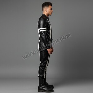 May include: Black and white leather jumpsuit with a vertical white stripe down the sides and sleeves. The jumpsuit has a belt and is paired with black boots. The outfit is a sleek, modern design.