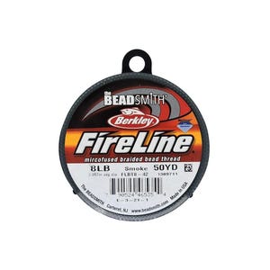 May include: A spool of gray FireLine microfused braided bead thread by Berkley. The spool is labeled with the text "8LB Smoke 50YD" and "0.007in avg dia FLBT8-42 1389711".