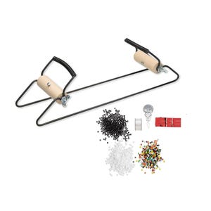 May include: A metal bead loom with two wooden rollers, black wire frame, and wing nuts. Included are small piles of black, white, and multicolored beads, a spool of clear thread, a silver needle threader, and a red needle case with needles.