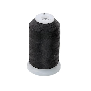 May include: A black thread spool with the word "BLK" printed on the top. The thread is tightly wound on a white plastic spool, ideal for sewing and craft projects. The thread is black.
