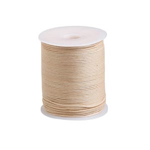 May include: A spool of light beige cord wrapped around a white plastic cylinder. The cord is thin, smooth, and tightly wound in multiple horizontal layers, covering the entire central section of the spool from top to bottom.
