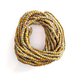 Java Trade Beads Striped Glass Beads 4 - 6mm Turquoise Mixed Colors. Sold per 24 inch / 61 cm strand