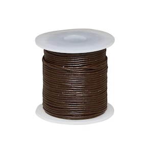 May include: A spool of dark brown round leather cord wrapped tightly around a white plastic cylinder. The cord has a smooth, consistent texture and is wound in multiple horizontal layers from the top to the bottom of the white spool ends.