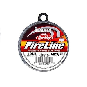 May include: A spool of 10lb Berkley FireLine Crystal microfused braided bead thread in a red, white, and black label. The label reads "The Beadsmith Carteret, NJ www.beadsmith.com Made in USA of domestic and imported components".
