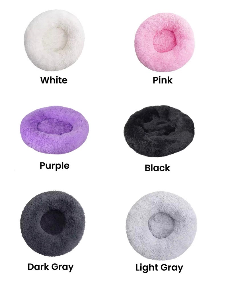 May include: Six different colors of round pet beds. The beds are made of soft, fluffy material and have a raised rim. The colors are white, pink, purple, black, dark gray, and light gray.