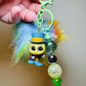 Jiminy Cricket colorful fluffy Disney keychain, bag charm with Pom Pom