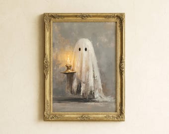 May include: A framed painting of a ghost holding a candle. The ghost is draped in a white sheet with two black eye holes. The candle sits on a gold-colored stand, and the frame is ornate gold. The background is a muted gray.
