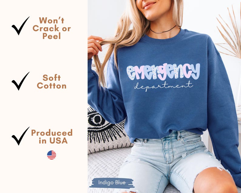 May include: Indigo blue sweatshirt with the words "Emergency department" in a bubble font. The text is in light blue and pink. The sweatshirt is made of soft cotton and produced in the USA.