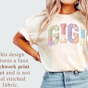 May include: Cream-colored t-shirt with the word "GIGI" in a patchwork print design. The letters are in various pastel colors and patterns, including floral and gingham. The text on the image says "This design features a faux patchwork print effect and is not real stitched fabric."