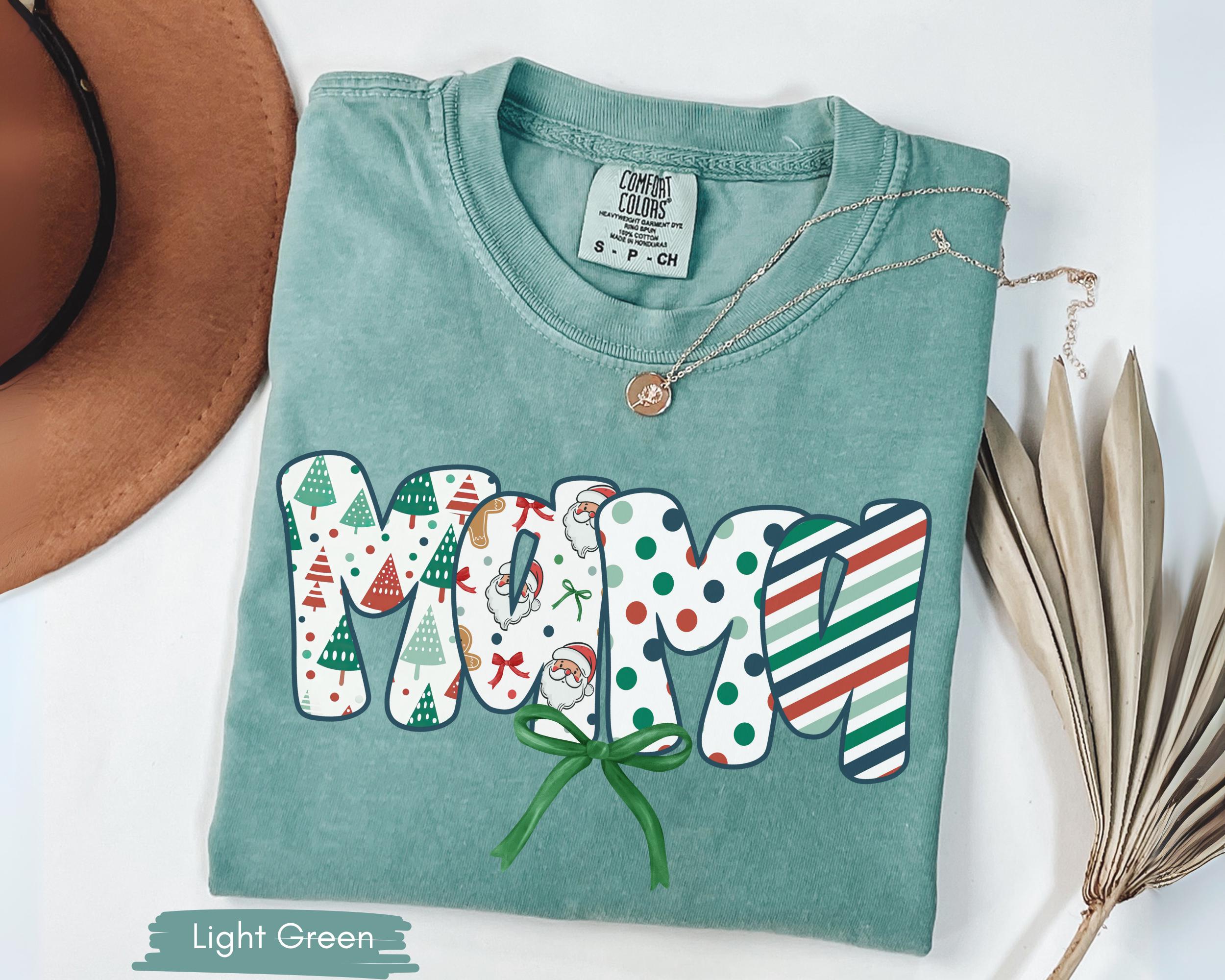 Comfort Colors® Christmas Mama Shirt, Cute Coquette Mom Tee, Holiday Gift For Her, Retro Xmas Mama Bow Shirt, Trendy Christmas T-Shirt