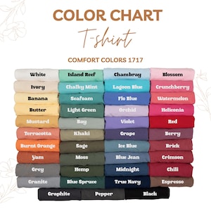 May include: A color chart for t-shirts displays a variety of folded shirts in various colors. The chart includes colors like white, blue, pink, red, and green, with the text "COLOR CHART T-shirt COMFORT COLORS 1717" at the top.